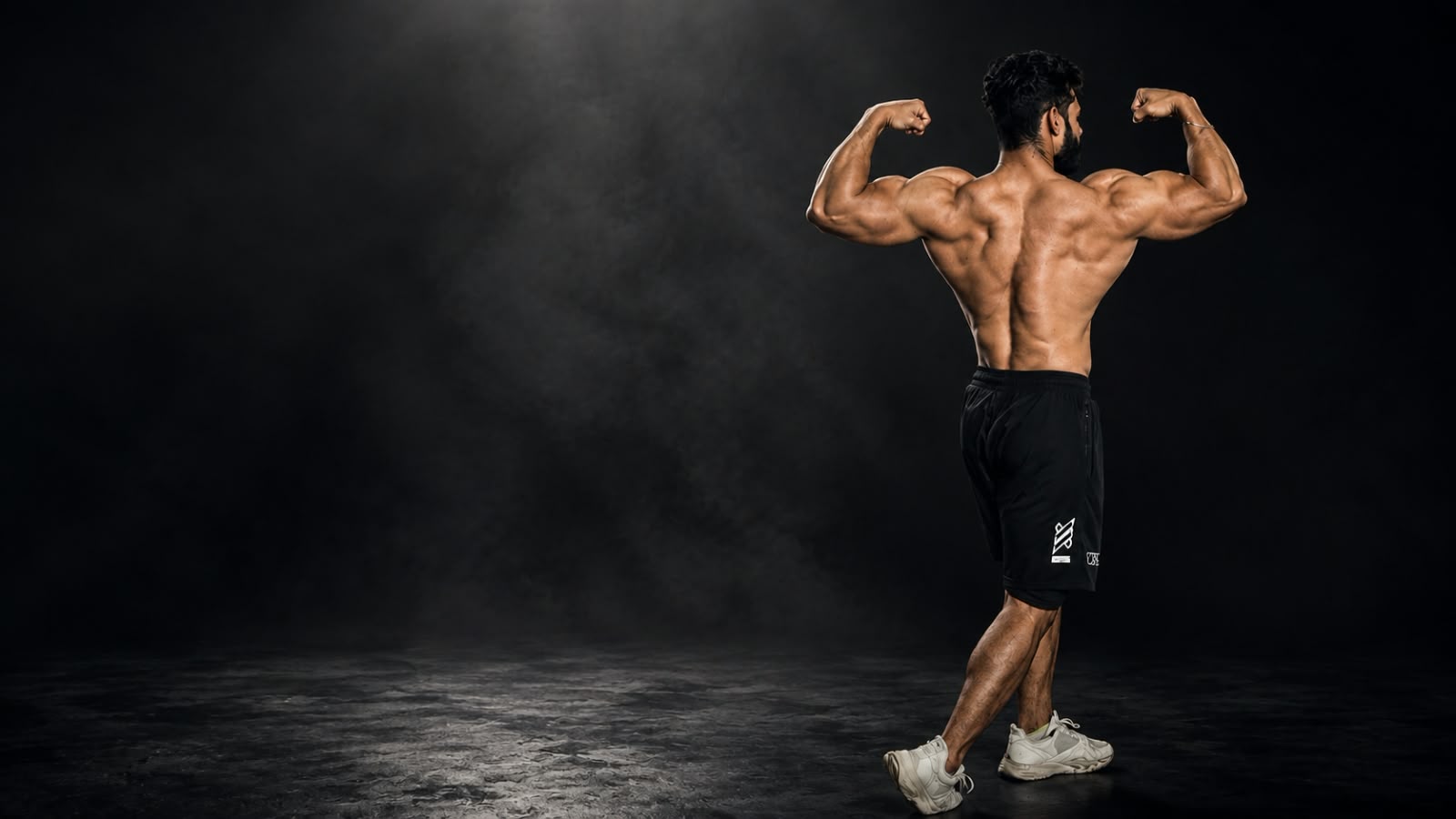 Nagra Fitness Zone athlete flexing